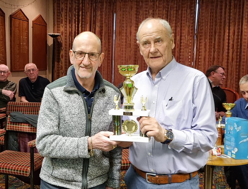 League Chairman, John Hilton, presents the Division 2 Merit trophy to Fred Lynch (St Anthonys)